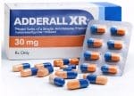 Adderall XR capsules and packaging displayed.