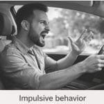 Person driving, expressing frustration.